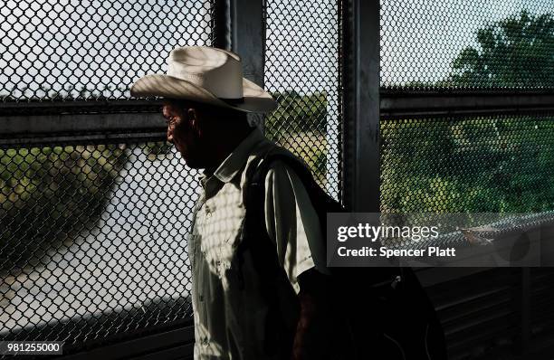 Mexican man waits to make the daily crossing into the American border city of Brownsville, a city which has become dependent on the daily crossing...