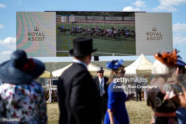 Watching the race on the big screen on day 4 of Royal Ascot at Ascot Racecourse on June 22, 2018 in Ascot, England.