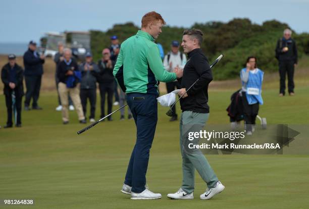 Robin Dawson , of Tramore is congratulated by opponent Conner Purcell of Portmarnock after his 3&2 win at the 16th hole during the Semi final of The...