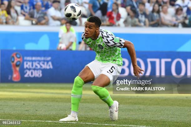 Nigeria's defender William Troost-Ekong heads the ball during the Russia 2018 World Cup Group D football match between Nigeria and Iceland at the...