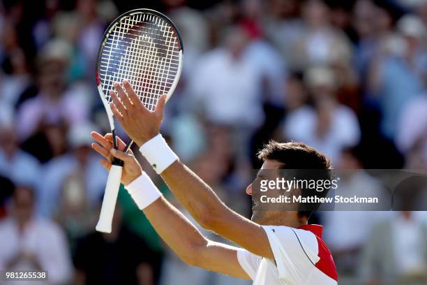 Novak Djokovic of Serbia celebrates his win during his men's singles quarterfinal match against Adrian Mannarino of France on Day Five of the...