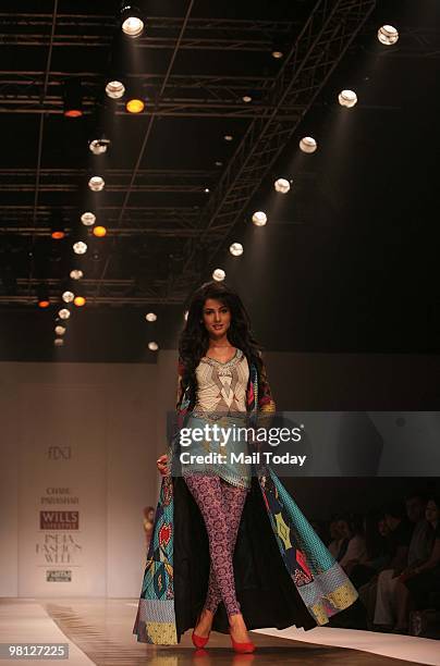 Actress Sonal Chauhan walks the ramp for designer Charu Parashar at day three of the Wills Lifestyle India Fashion Week Autumn Winter 2010 in New...