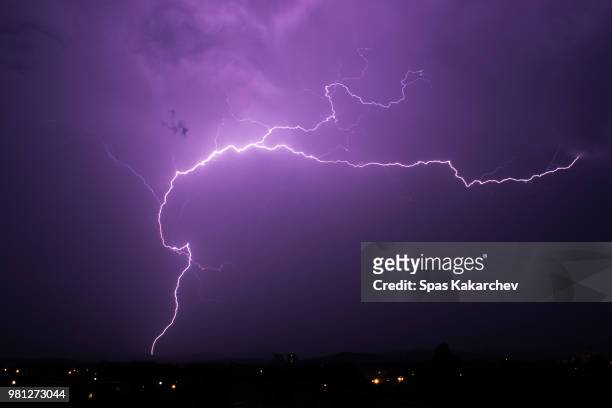 violet lightning - forked lightning stock pictures, royalty-free photos & images