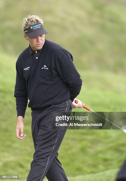 Darren Clarke misses a birdie putt on the 18th green at Whistling Straits, site of the 86th PGA Championship in Haven, Wisconsin August 12, 2004....