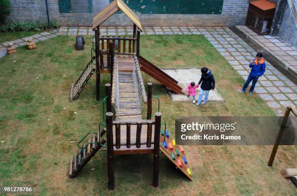 playground made of treated eucalyptus, ecological wood with high durability, high resolution photography located in cotia in the metropolitan region of são paulo in brazil, são paulo, brazil, june 16, 2018 - slide stock pictures, royalty-free photos & images