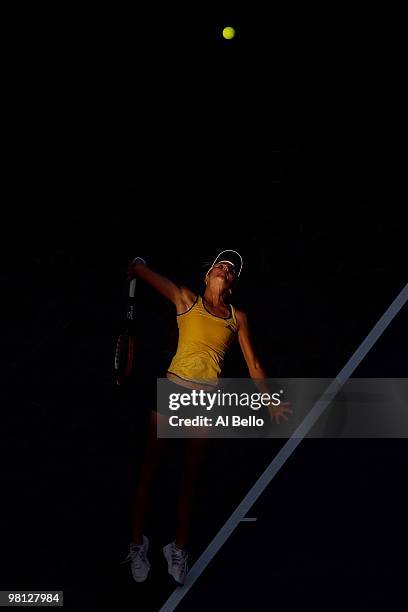 Daniela Hantuchova of Slovakia serves against Venus Williams of the United States during day seven of the 2010 Sony Ericsson Open at Crandon Park...