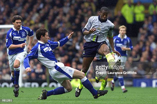 Apr 2001. Paulo Wanchope of Man City rides a challenge from David Wier of Everton during the FA Carling Premiership game between Everton and...