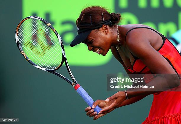 Venus Williams of the United States reacts after a shot against Daniela Hantuchova of Slovakia during day seven of the 2010 Sony Ericsson Open at...
