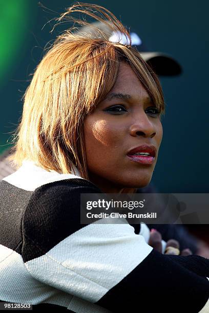 Serena Williams watches as her sister Venus Williams of the United States plays against Daniela Hantuchova of Slovakia during day seven of the 2010...