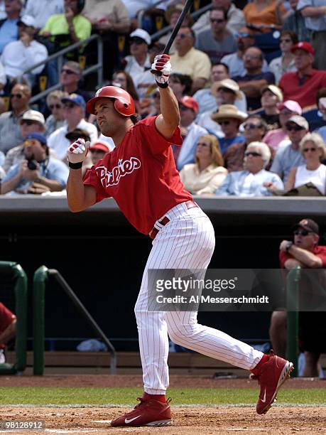 Philadelphia Phillies outfielder Pat Burrell homers off Houston Astros pitcher Carlos Hernandez in a spring training game March 7, 2005 in...