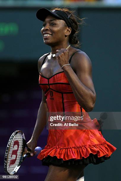 Venus Williams of the United States celebrates after defeating Daniela Hantuchova of Slovakia during day seven of the 2010 Sony Ericsson Open at...