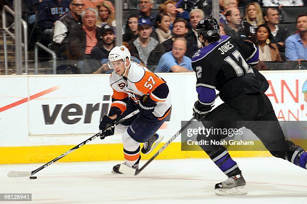 Blake Comeau of the New York Islanders skates against Randy Jones of the Los Angeles Kings at Staples Center on March 20, 2010 in Los Angeles,...