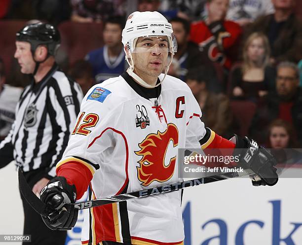 Jarome Iginla of the Calgary Flames skates to the bench during their game against the Vancouver Canucks at General Motors Place on March 14, 2010 in...