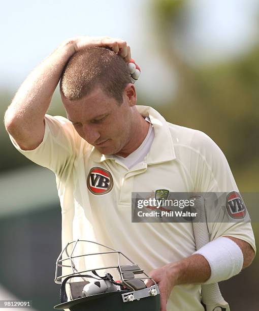 Brad Haddin of Australia walks off the field after being bowled by Jeetan Patel of New Zealand during day four of the Second Test match between New...