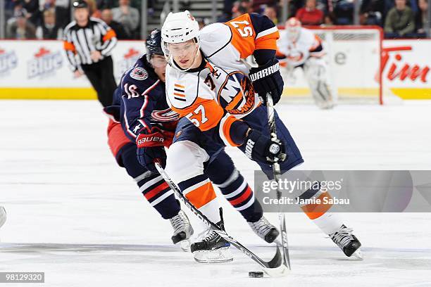 Forward Blake Comeau of the New York Islanders skates with the puck against the Columbus Blue Jackets on March 27, 2010 at Nationwide Arena in...