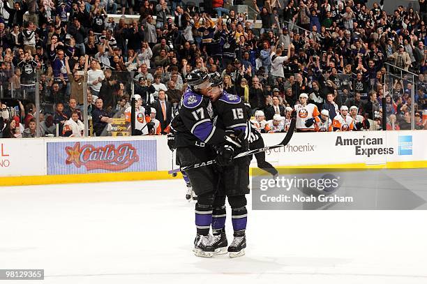 Wayne Simmonds and Brad Richarson of the Los Angeles Kings celebrate a victory over the New York Islanders at Staples Center on March 20, 2010 in Los...