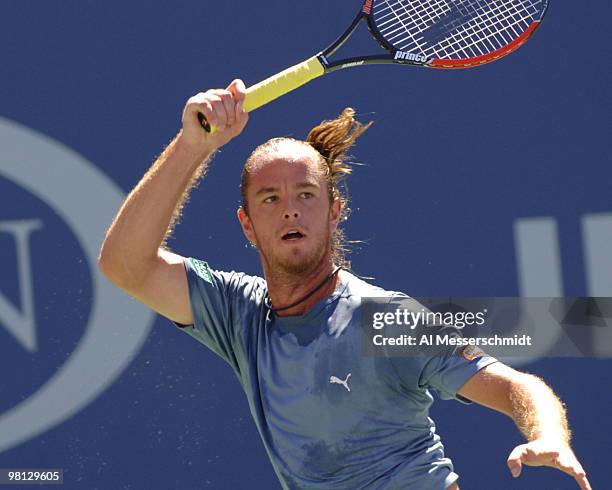 Xavier Malisse falls to Andre Agassi 6-3 6-4 6-7 4-6 6-2 in a men's fourth round at the 2005 U. S. Open in Flushing, New York on September 5, 2005.