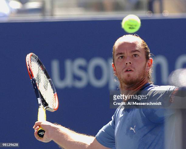 Xavier Malisse falls to Andre Agassi 6-3 6-4 6-7 4-6 6-2 in a men's fourth round at the 2005 U. S. Open in Flushing, New York on September 5, 2005.