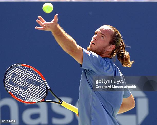 Xavier Malisse falls to Andre Agassi 6-3 6-4 6-7 4-6 6-2 in a men's fourth round at the 2005 U. S. Open in Flushing, New York on September 5, 2005.