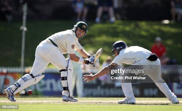 Marcus North of Australia bats the ball past BJ Watling of New Zealand during day four of the Second Test match between New Zealand and Australia at...