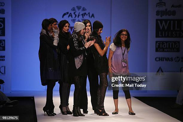 Models applaud designer Pashma after her show at day two of the Wills Lifestyle India Fashion Week Autumn Winter 2010 in New Delhi on March 26, 2010.