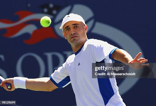 Andre Agassi defeats Xavier Malisse 6-3 6-4 6-7 4-6 6-2 in a men's fourth round match at the 2005 U. S. Open in Flushing, New York on September 5,...