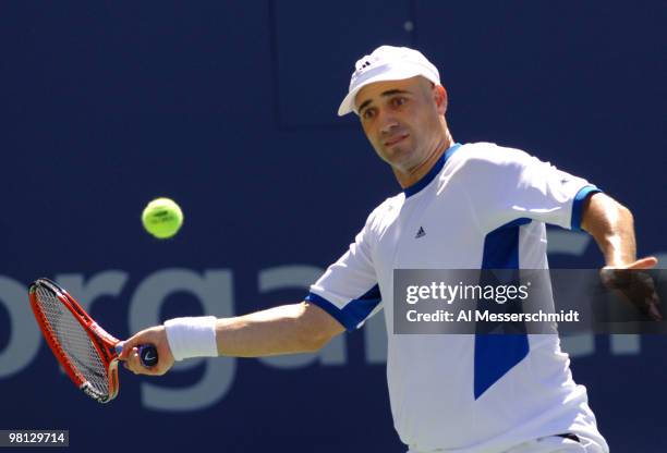 Andre Agassi defeats Xavier Malisse 6-3 6-4 6-7 4-6 6-2 in a men's fourth round match at the 2005 U. S. Open in Flushing, New York on September 5,...