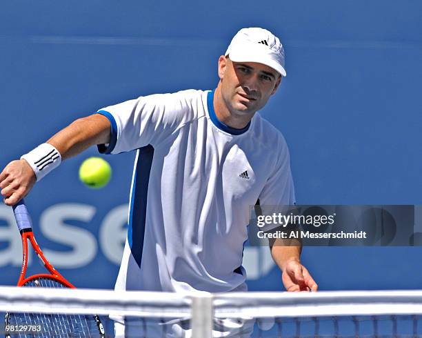 Andre Agassi defeats Xavier Malisse 6-3 6-4 6-7 4-6 6-2 in a men's fourth round match at the 2005 U. S. Open in Flushing, New York on September 5,...