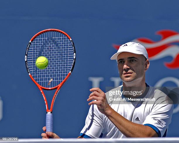 Andre Agassi defeats Xavier Malisse 6-3 6-4 6-7 4-6 6-2 in a men's fourth round match at the 2005 U. S. Open in Flushing, New York on September 5,...