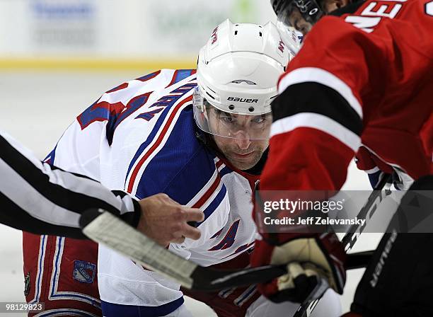 Chris Drury of the New York Rangers waits for the puck to drop against the New Jersey Devils at the Prudential Center on March 25, 2010 in Newark,...