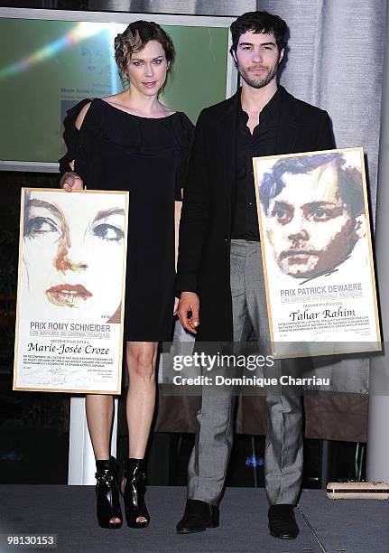 Marie Josee Croze and Tahar Rahim pose after receiving the Romy Schneider and Patrick Deweare awards at Hotel Renaissance on March 29, 2010 in Paris,...