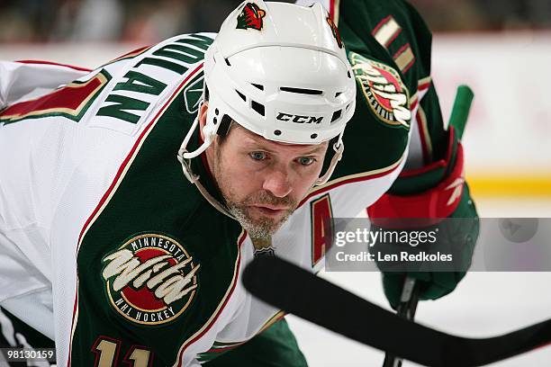 Owen Nolan of the Minnesota Wild readies himself for a faceoff against the Philadelphia Flyers on March 25, 2010 at the Wachovia Center in...