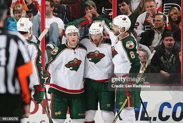 Martin Havlat of the Minnesota Wild celebrates his goal with his teammates Casey Wellman and Brent Burns against the Philadelphia Flyers on March 25,...