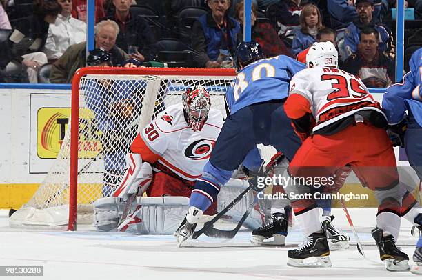 Nik Antropov of the Atlanta Thrashers scores a goal against Patrick Dwyer of the Carolina Hurricanes at Philips Arena on March 29, 2010 in Atlanta,...