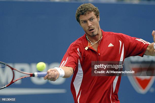 Marat Safin returns a serve from Tommy Haas during a fourth-round men's singles match September 5, 2006 during the 2006 US Open in Flushing Meadows,...