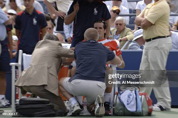 Tommy Haas receives a medical timeout during his third round match against Robby Ginepri at the 2006 US Open at the USTA Billie Jean King National...