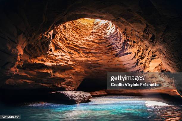 magdalen islands cave interior, quebec, canada - cave stock pictures, royalty-free photos & images