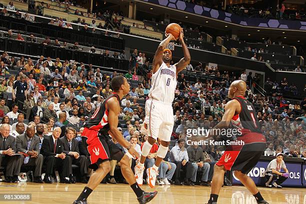 Larry Hughes of the Charlotte Bobcats shoots a jumpshot against Jarrett Jack of the Toronto Raptors on March 29, 2010 at the Time Warner Cable Arena...