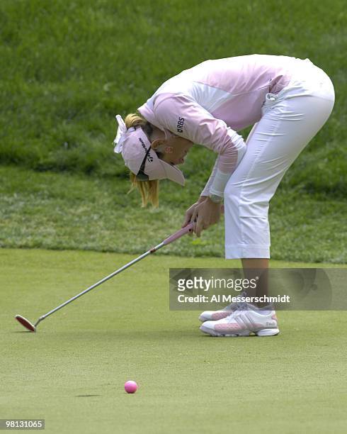 Paula Creamer reacts to a putt during the fourth and final round of the Michelob ULTRA Open at Kingsmill Resort and Spa in Williamsburg, Virginia on...