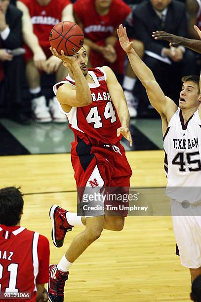 Ryan Anderson of the Nebraska Cornhuskers goes up for a shot over Nathan Walkup of the Texas A&M Aggies during the quarterfinals of the 2010 Phillips...