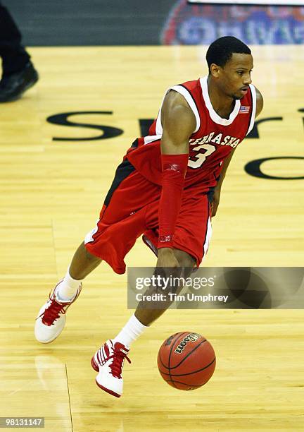 Brandon Richardson of the Nebraska Cornhuskers tries to dribble around the defense of the Texas A&M Aggies during the quarterfinals of the 2010...