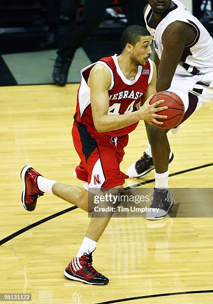 Ryan Anderson of the Nebraska Cornhuskers tries to dribble around Bryan Davis of the Texas A&M Aggies during the quarterfinals of the 2010 Phillips...