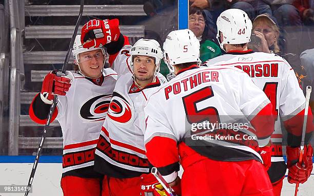 Jussi Jokinen of the Carolina Hurricanes celebrates his goal against the Atlanta Thrashers with Chad LaRose, Brian Pothier and Jay Harrison at...