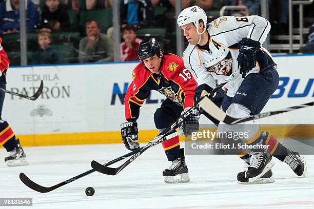 Nathan Horton of the Florida Panthers battles for the puck against Shea Weber of the Nashville Predators at the BankAtlantic Center on March 29, 2010...