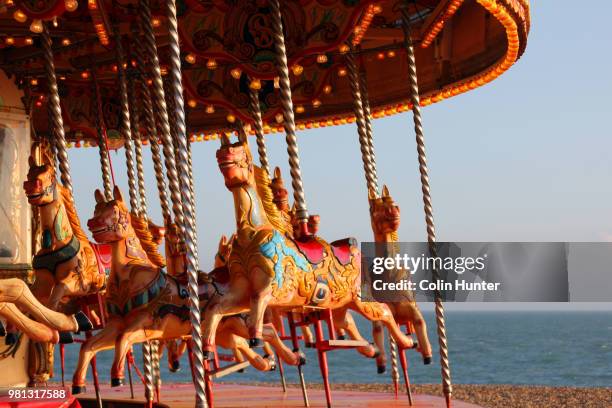 horses on brighton beach - carousel stock pictures, royalty-free photos & images