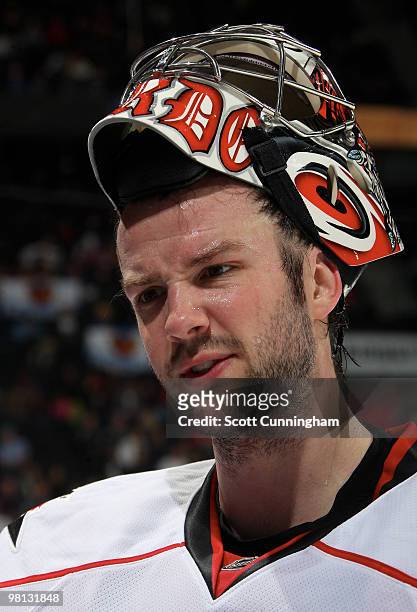 Cam Ward of the Carolina Hurricanes relaxes during a timeout against the Atlanta Thrashers at Philips Arena on March 29, 2010 in Atlanta, Georgia.