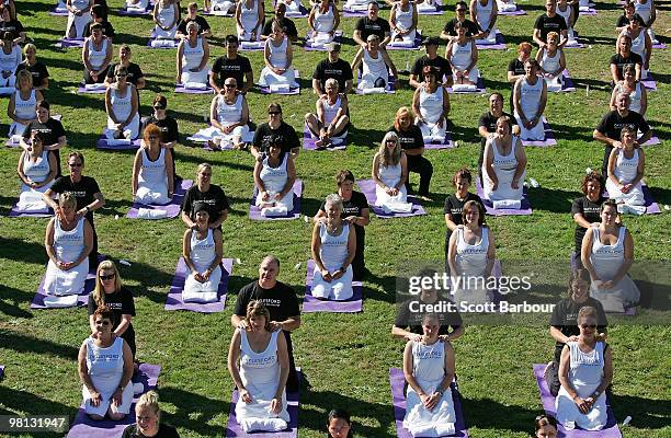 Volunteers receive a professional massage from qualified therapists as they break a world record for the largest ever simultaneous massage during...