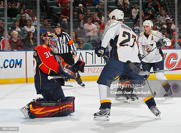 Goaltender Scott Clemmensen of the Florida Panthers stops a shot by Patric Hornqvist of the Nashville Predators on March 29, 2010 at the BankAtlantic...