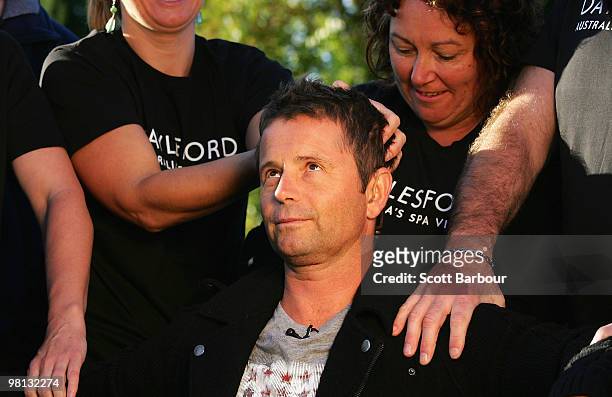Television presenter Steven Jacobs receives a massage before he takes part in a world record for the largest ever simultaneous massage during Massage...