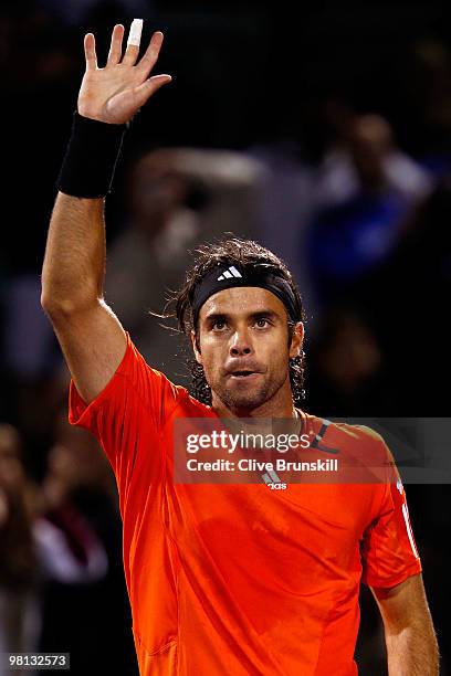 Fernando Gonzalez of Chile celebrates his win over Juan Monaco of Argentina during day seven of the 2010 Sony Ericsson Open at Crandon Park Tennis...